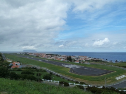 The runway with the island of Corvo in the background